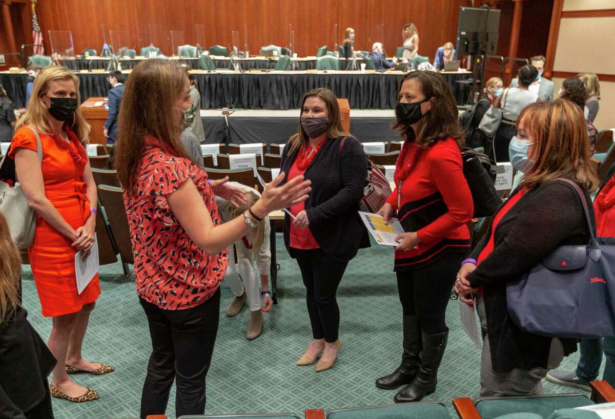 Supporters of House Bill 3880 gather Tuesday, April 27, 2021 in the Capitol extension complex during a break of the House Public Education Committee. The committee is scheduled to take up the bill Tuesday which would make it easier for dyslexic students to qualify for special education.