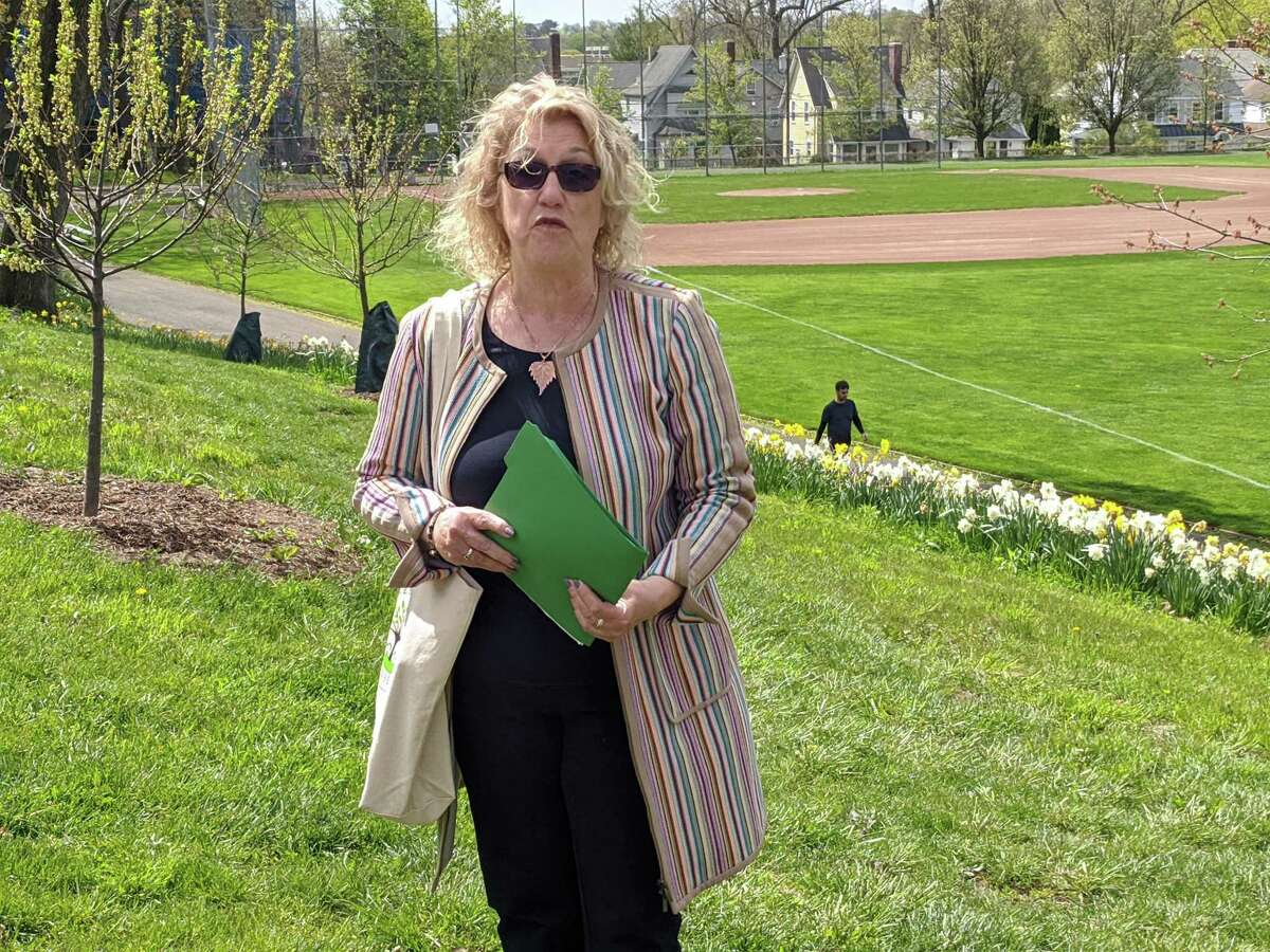 JoAnn Messina, executive director of the Greenwich Tree Conservancy, helps dedicate the new Gratitude Grove behind Town Hall on Friday April 20 2021. The conservancy oversaw the planting of 15 new trees in honor of Greenwich’s heroes, including front line medical workers and first responders, during the pandemic.