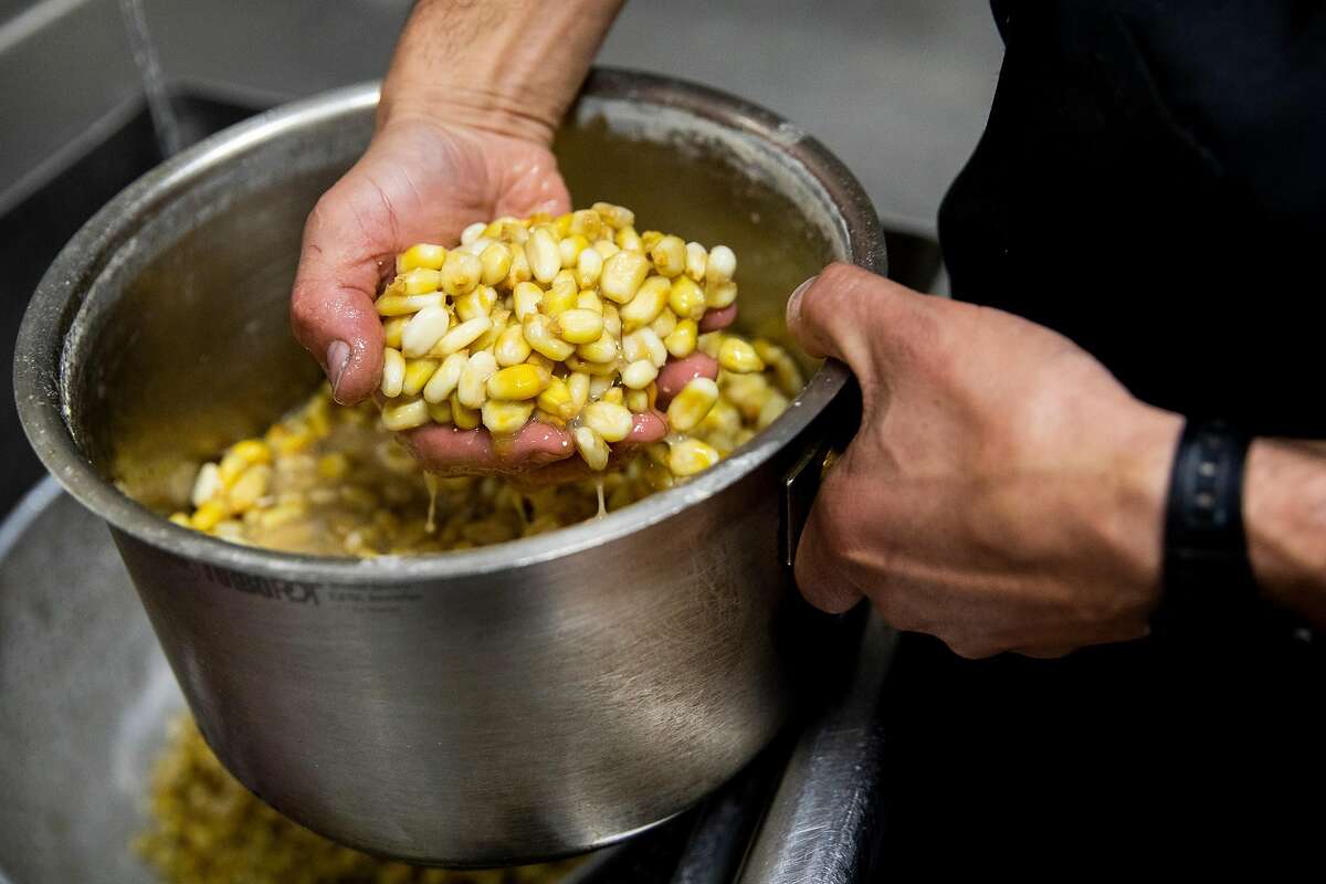 Otra Chef and co-owner Nick Cobarruvias works to make fresh masa in the kitchen of Otra in the Haight-Ashbury neighborhood of San Francisco, Calif. Friday, April 30, 2021. The team behind eclectic Mission District favorite Son's Addition is gearing up for a new, funky restaurant in the Lower Haight called Otra. Chef and co-owner Nick Cobarruvias is taking inspiration from the simple, homey Mexican food he ate as a kid but presenting it in a contemporary way, with freshly made masa and heirloom beans as the driving force.