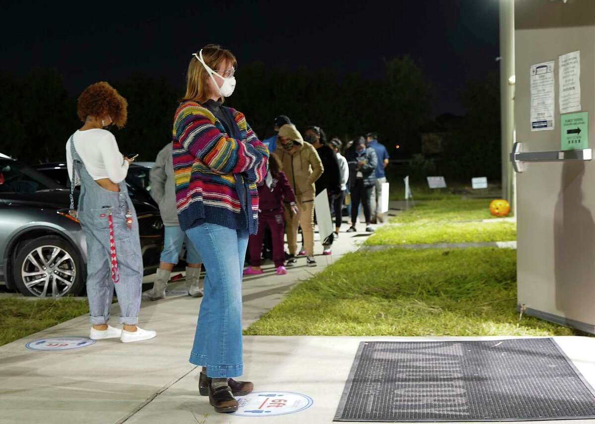 Aubrey Calaway, 23, waits to vote outside Victory Houston polling station in Houston on Friday, Oct. 30, 2020. The location was one of the Harris County's 24-hour locations.