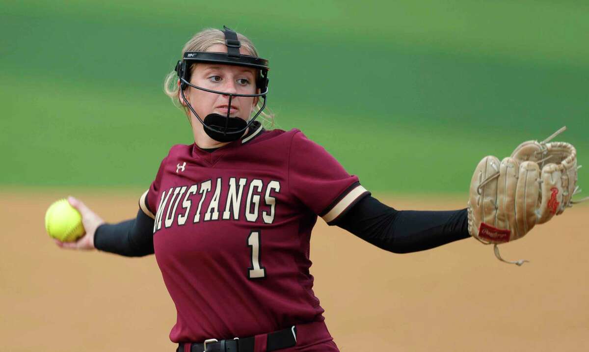 Magnolia West starting pitcher Toni Tamborello (1) throws during the first inning in Game 2 of a Region III-5A bi-district softball series at Grand Oaks High School, Friday, April 30, 2021, in Spring.