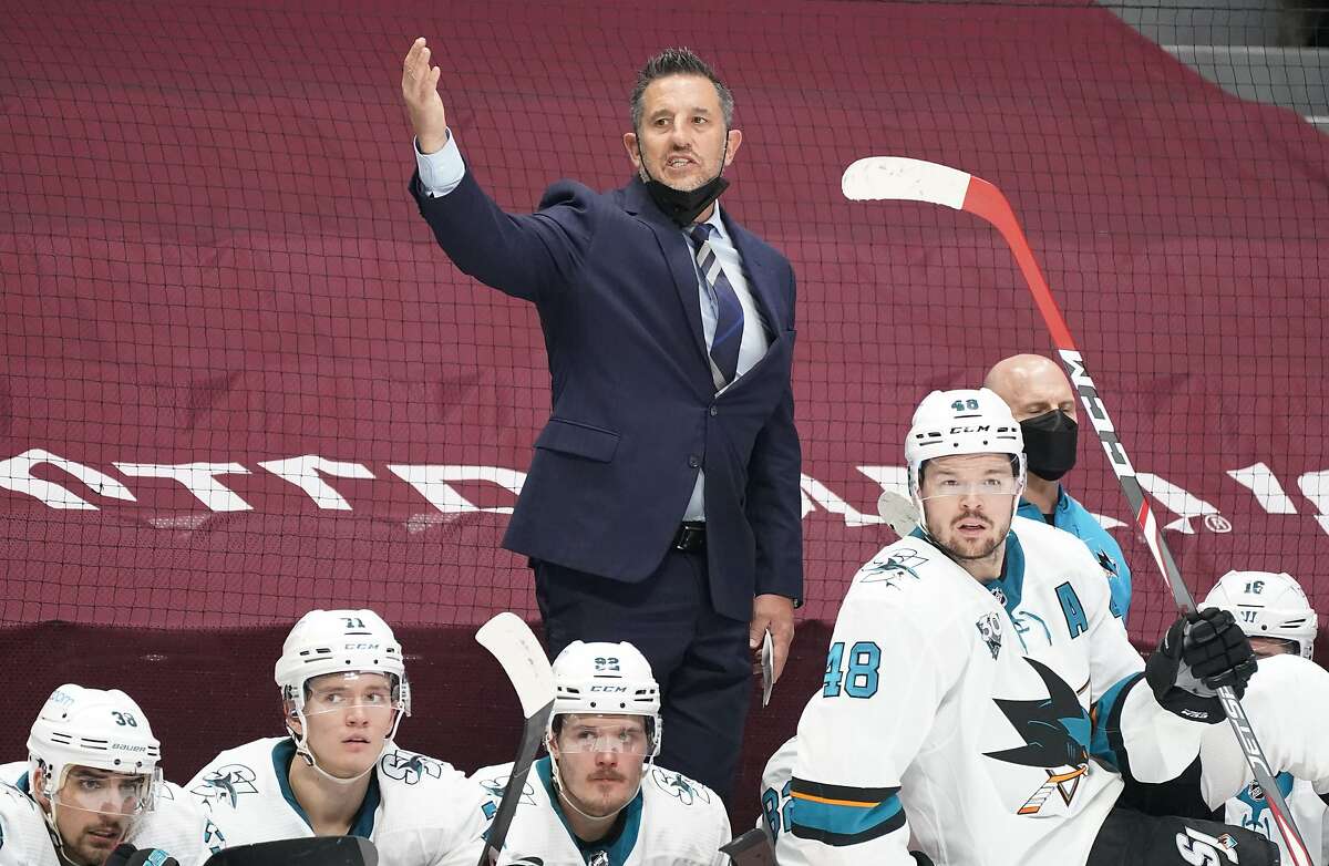 Sharks head coach Bob Boughner waves goaltender Martin Jones off the ice late in the third period.