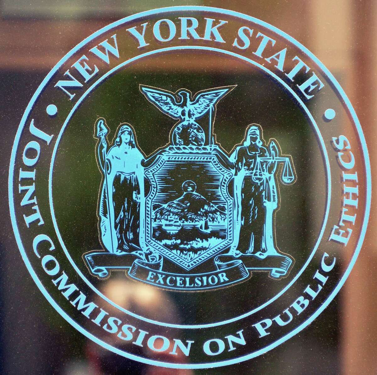 Logo at the entrance to the NYS Joint Commission on Public Ethics offices in Albany, NY, Tuesday May 28, 2013. (John Carl D'Annibale / Times Union)