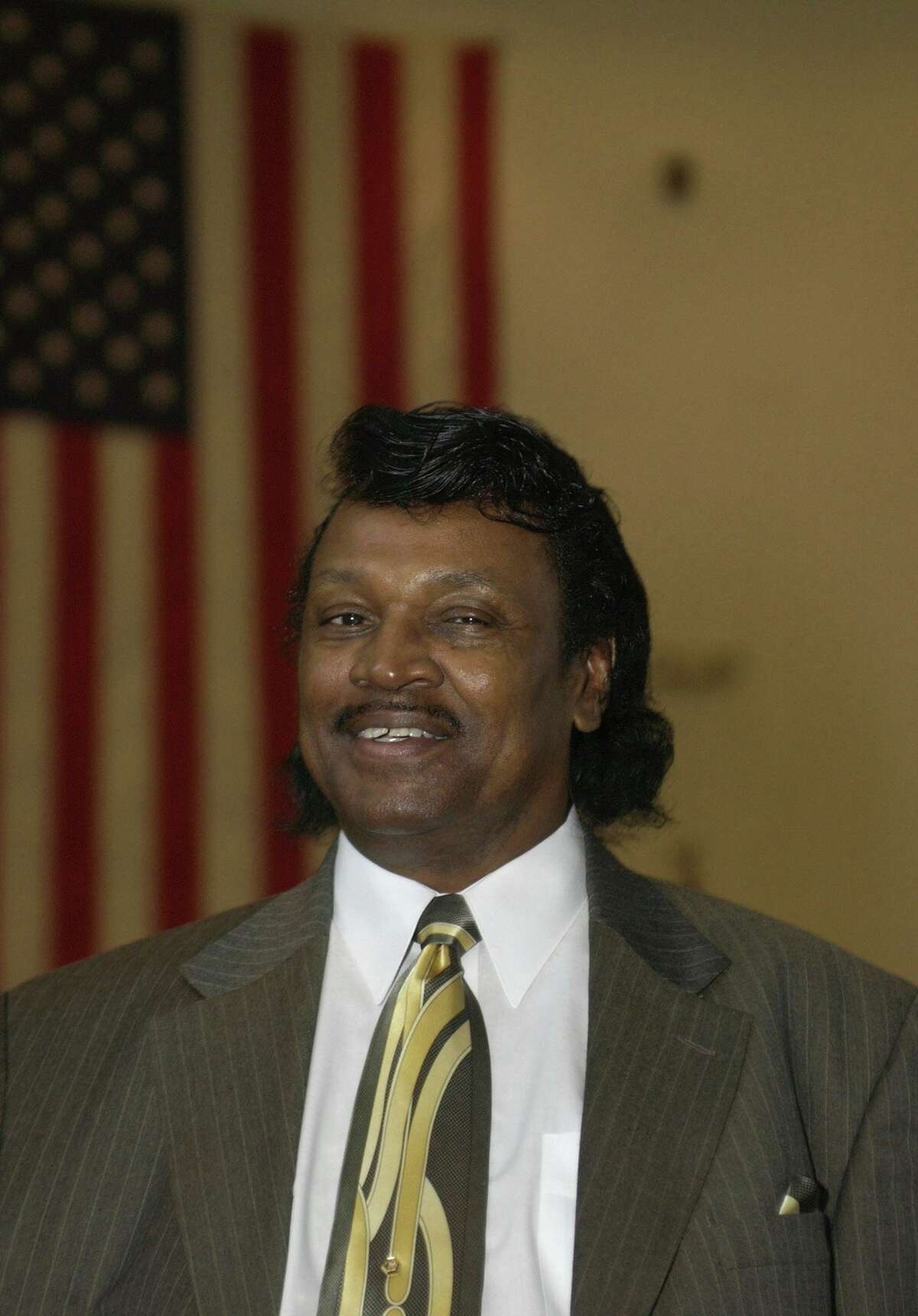 Chief Quiet Hawk (Aurelius Piper Jr.) of the Golden Hill Paugussett tribe, waits to sign a contract with the city at City Hall in Bridgeport, Conn., in this Dec. 19, 2002, file photo.