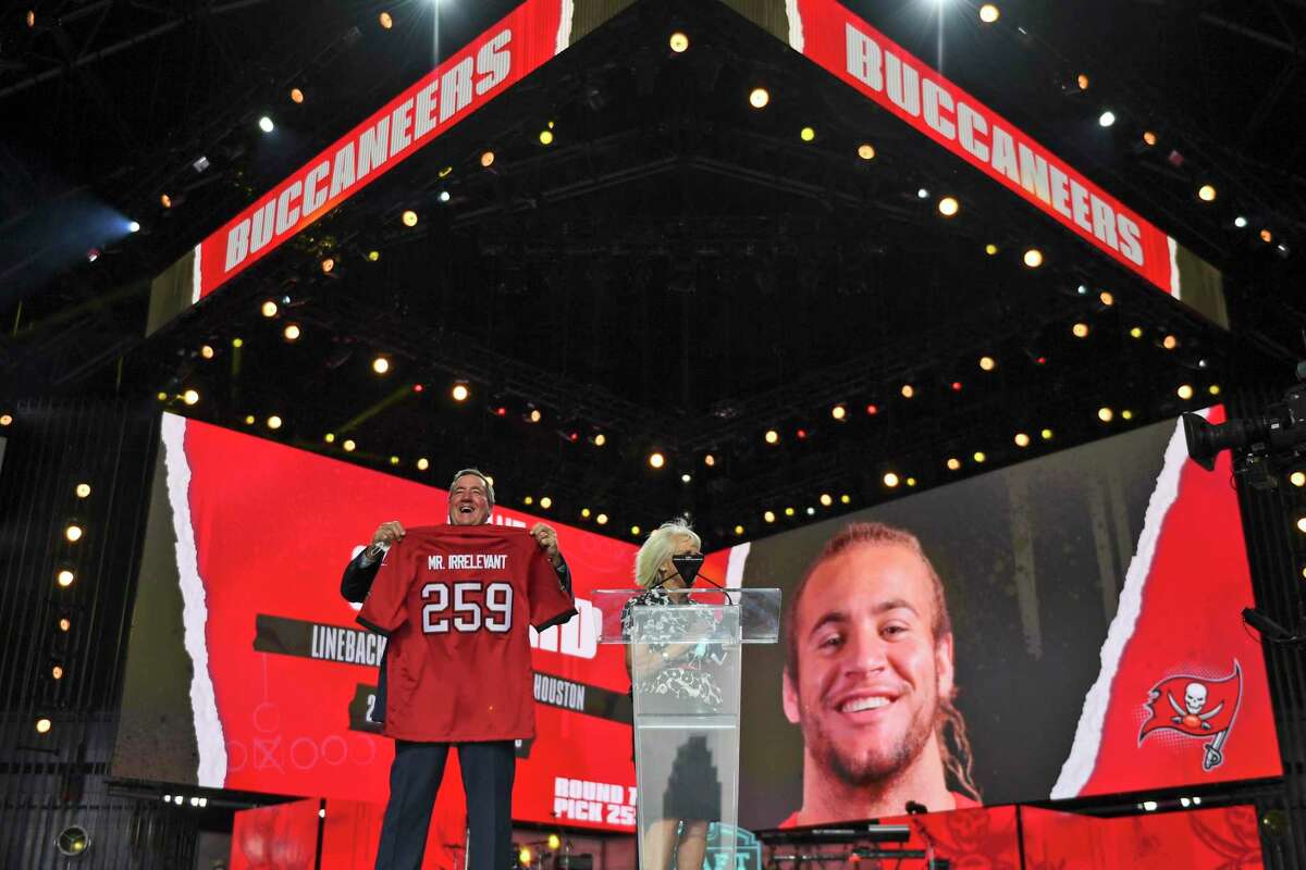 A Mr. Irrelevant jersey is held up for the Tampa Bay Buccaneers' pick during the seventh round of the NFL football draft, Saturday, May 1, 2021, in Cleveland. The final pick of the draft was Grant Stuard, a linebacker from Houston.