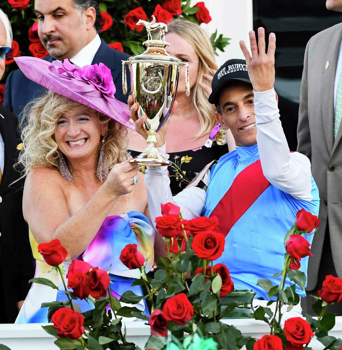 Jockey John Velazquez, with wife Leona celebrate after winning the 147th running of The Kentucky Derby at Churchill Downs Race Track Saturday May 1, 2021 in Louisville, Kentucky. Photo Special to the Times Union by Skip Dickstein