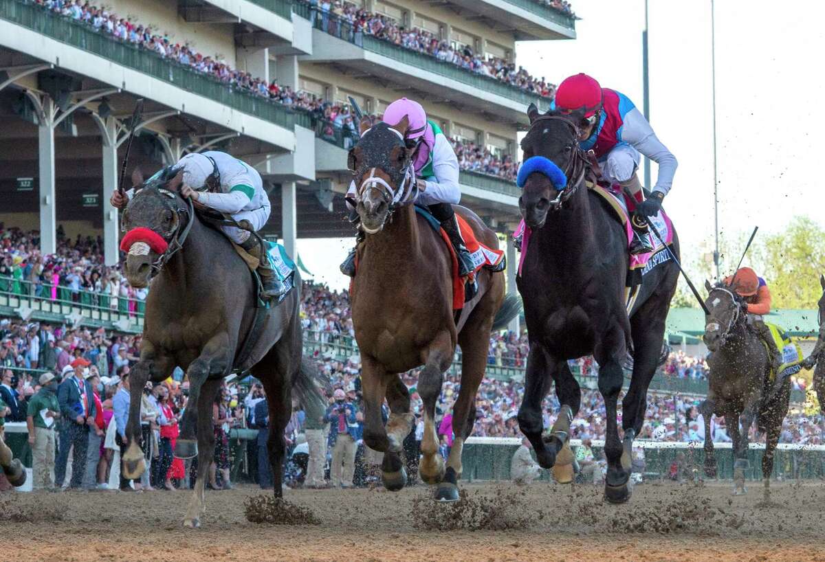 Medina Spirit with jockey John Velazquez aboard wins the 147th running of The Kentucky Derby at Churchill Downs Race Track Saturday May 1, 2021 in Louisville, Kentucky. Photo Special to the Times Union by Skip Dickstein