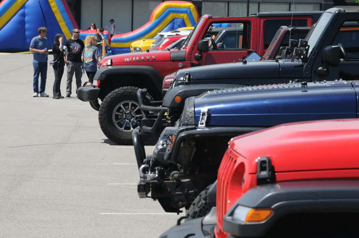 Some of the dozens of participants during Jeep Day on Saturday in East Gate Plaza.