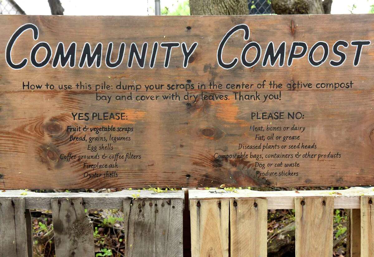 Sign above the community compost pile at Edible Uprising Farm owned by Ben Stein and his wife Alicia Brown on Friday, April 30, 2021 in Troy, N.Y. The city of Troy is starting its own municipal composting program. (Lori Van Buren/Times Union)