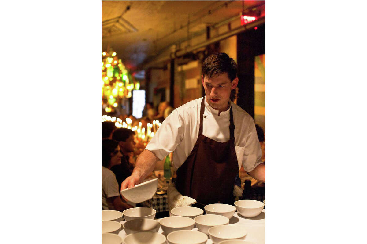 Blaine Wetzel, chef at the Willows Inn on Washington's Lummi Island, prepares dishes in New York in September 2011. A recent New York Times investigation detailed allegations of abuse at the restaurant under his watch.