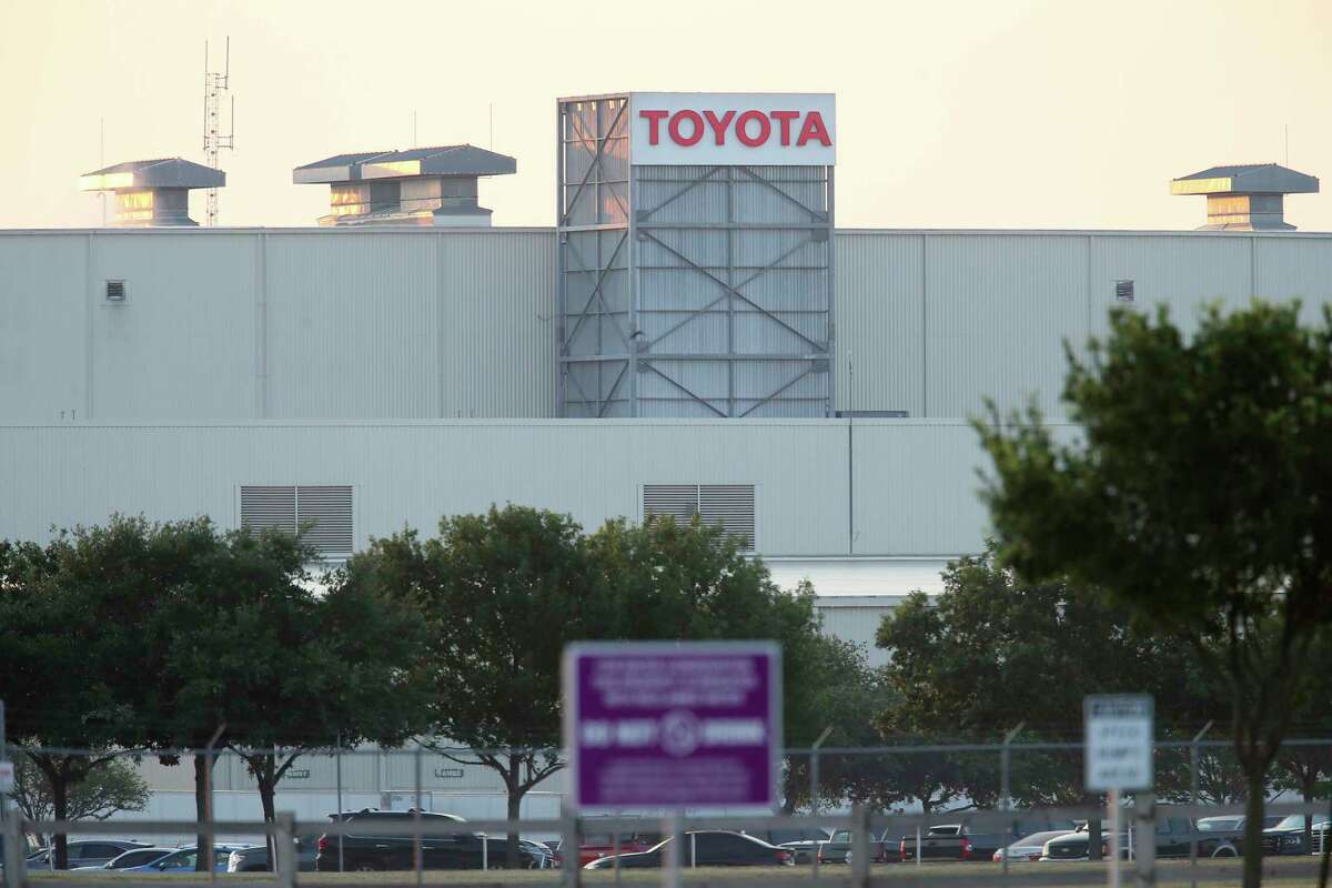Vehicles are seen in a parking lot at the San Antonio Toyota plant, Monday, May 11, 2020. 