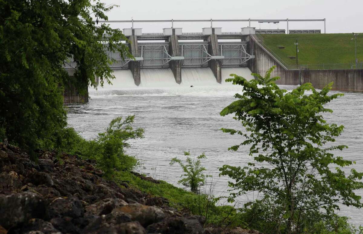 Heavy rainfall that moved into Montgomery County raised Lake Conroe a foot above its normal pool level, prompting the San Jacinto River Authority to start releasing water, Friday, April 30, 2021, in Conroe. Normal pool for the lake is 201 feet, however, by Friday afternoon the lake was up to 202.23 feet and rising. SJRA officials said several areas around the lake and some tributaries had seen several inches of accumulation. Lake Conroe at FM 1375 had about 4.4 inches of accumulation, Lake Creek in Dobbin was up almost 6 inches and Lake Creek at Egypt was at 2.6 inches followed by Lewis Creek at 4.12.