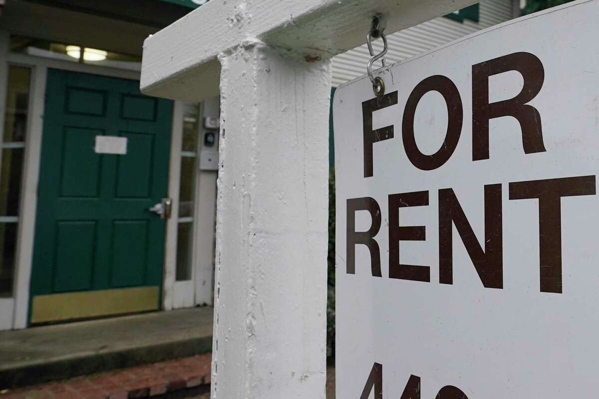 A "For Rent" sign.