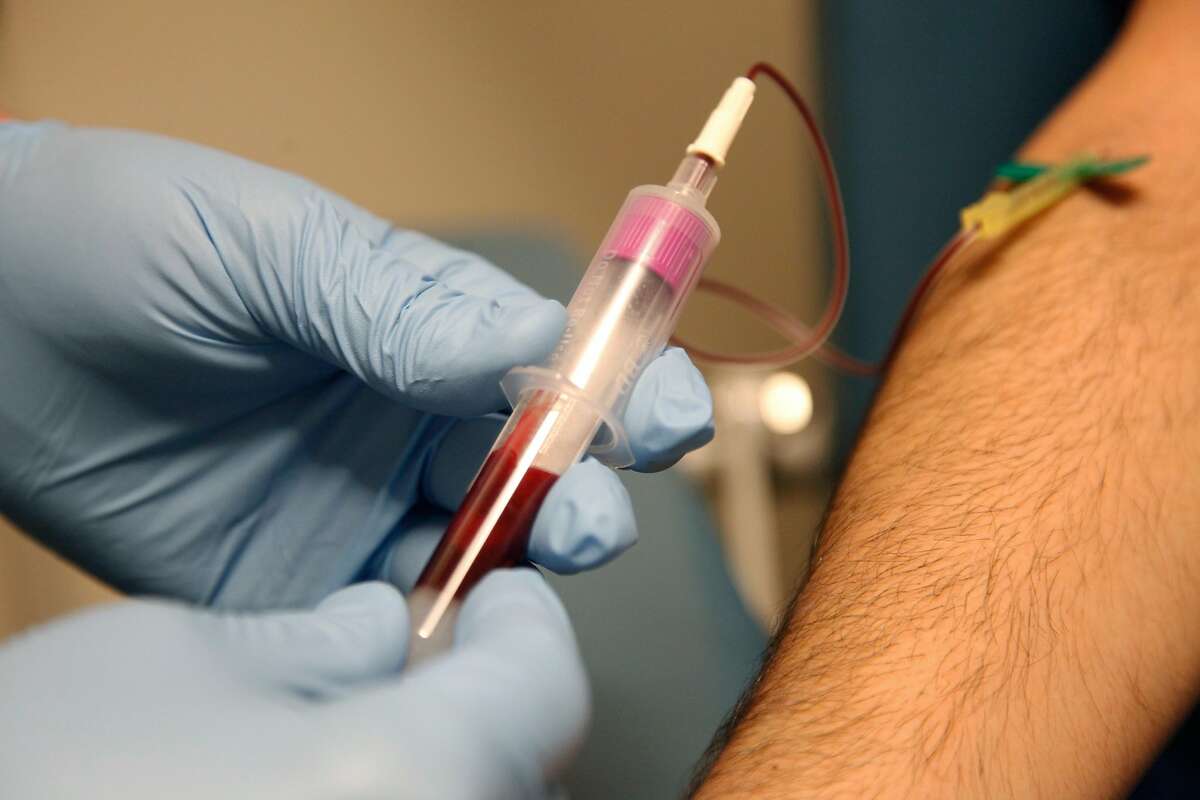 A phlebotomist draws blood for HIV testing at Magnet Health Center in San Francisco Calif. on Thursday, Aug. 9, 2012. Magnet recently celebrated 9 years in the Castro District and expects to test 12,000 people for HIV in 2012.