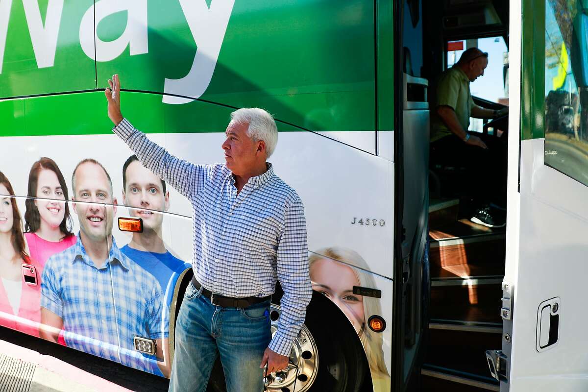 Republican gubernatorial candidate John Cox waves goodbye after making a campaign stop at Platinum Auto Collision and Paint to discuss the Bay Area housing crisis in Berkeley, California, on Monday, Nov. 5, 2018.