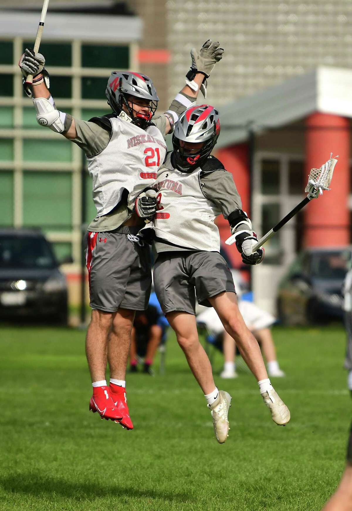 Niskayuna’s Brock Behrman, left, celebrates with Cole Nappi after scoring during a lacrosse scrimmage against Shenendehowa on Monday, May 3, 2021 in Niskayuna, N.Y. (Lori Van Buren/Times Union)