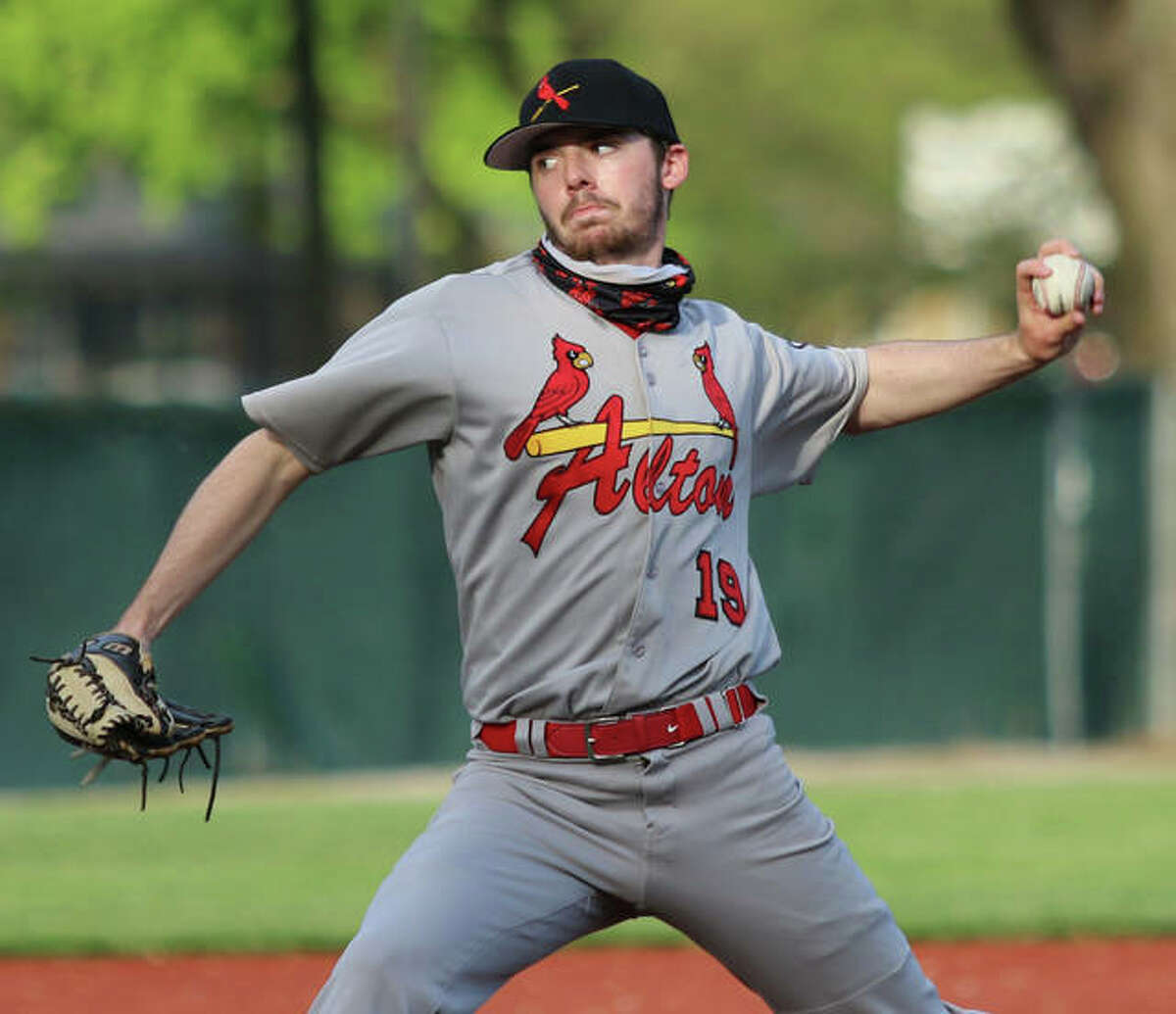 Alton reliever Ian Barnard delivers to the plate during a scoreless fourth inning against O'Fallon in a SWC baseball game Monday at Blazier Field in O'Fallon.