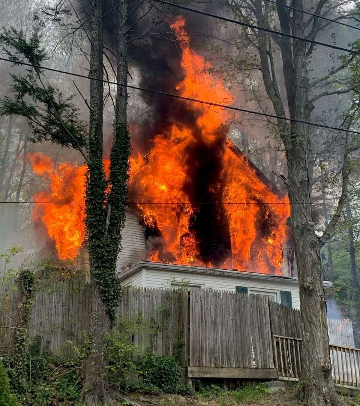 Shelton firefighters battled a blaze at a Long Hill Avenue home on Monday, May 3, 2021.