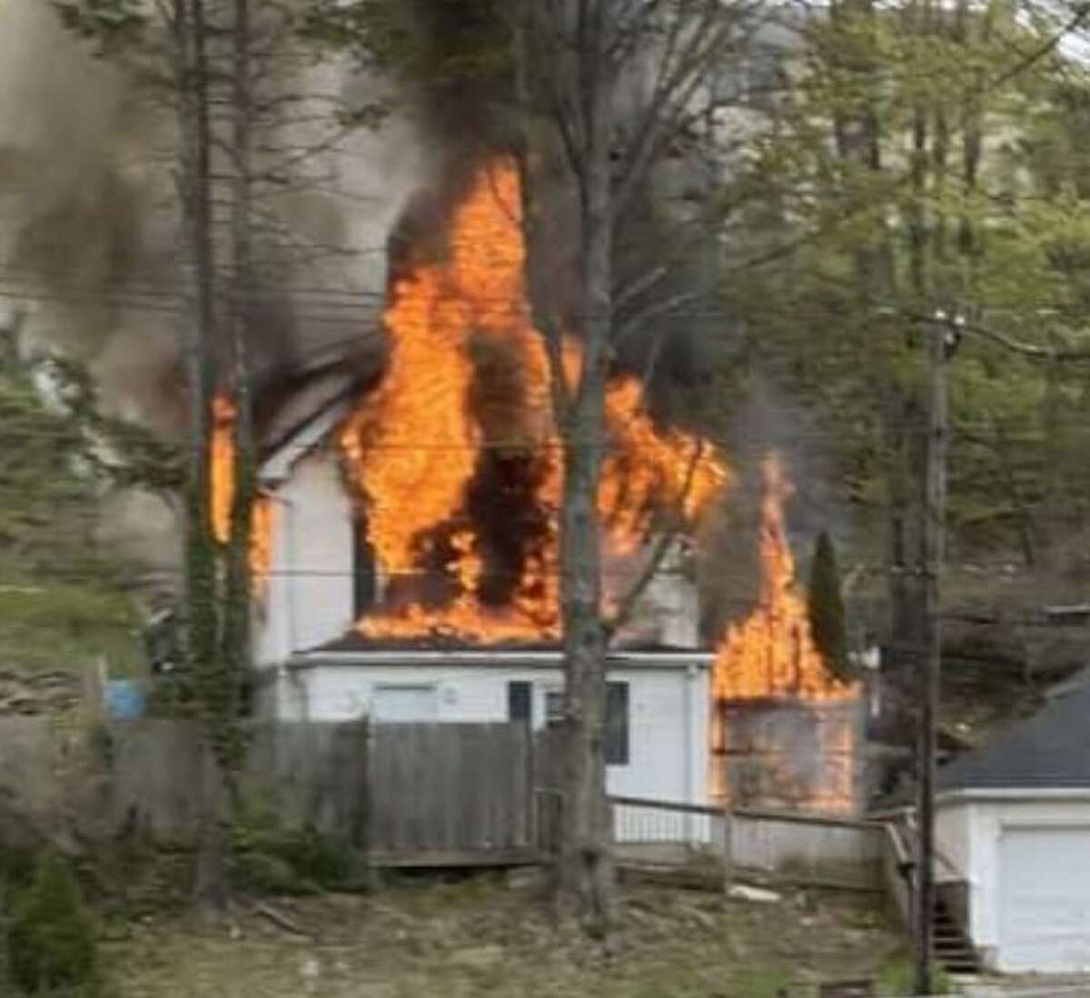 Shelton firefighters battled a blaze at a Long Hill Avenue home on Monday, May 3, 2021.