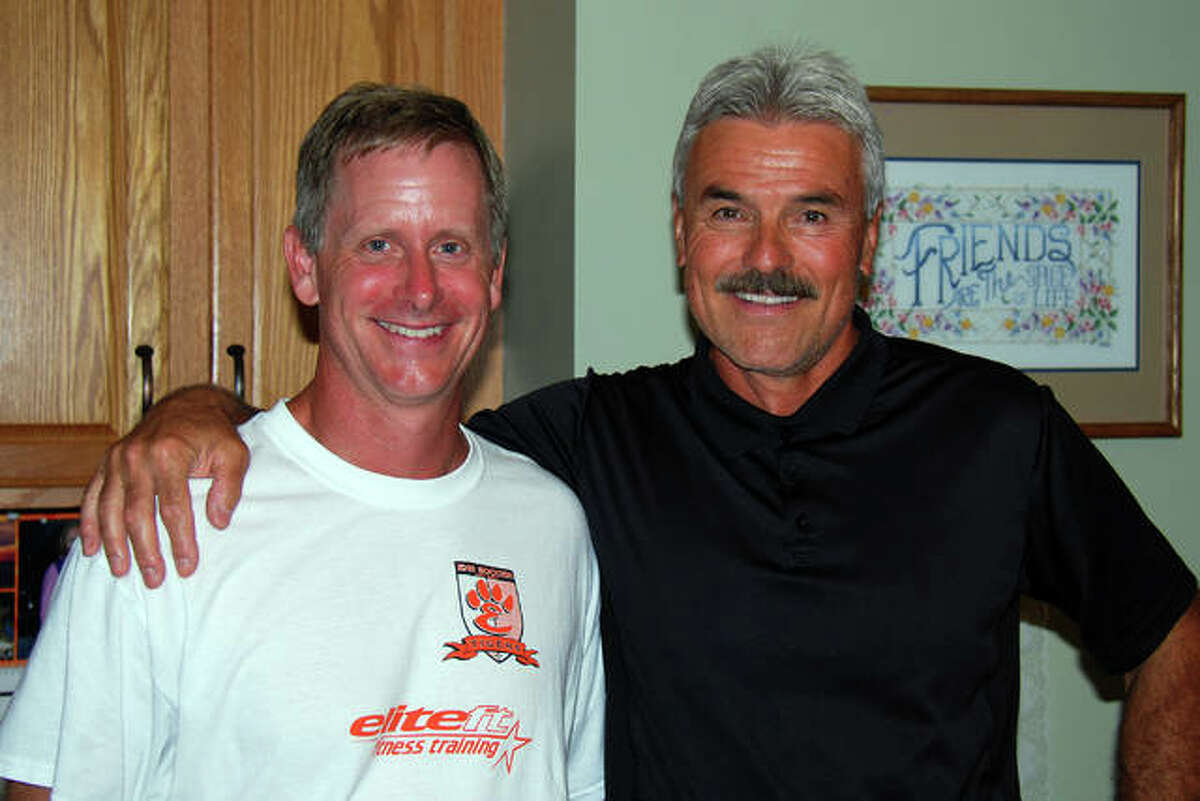 Former Edwardsville boys soccer coach Bruno Gwardys, right, with current coach Mark Heiderscheid in August 2016 when Gwardys returned to Edwardsville to celebrate the 40th anniversary of the soccer program. Gwardys was the Tigers’ first head coach from 1976 to 1982.