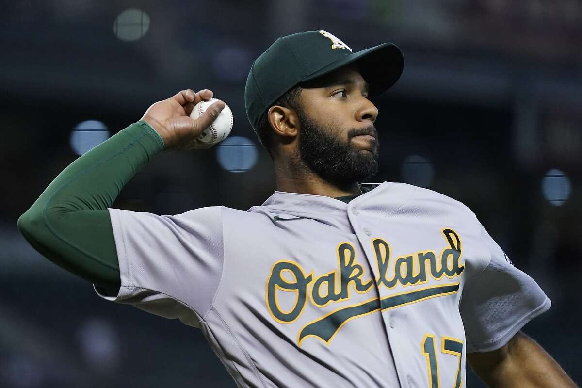 Oakland Athletics shortstop Elvis Andrus warms up prior to a baseball game against the Arizona Diamondbacks Tuesday, April 13, 2021, in Phoenix. (AP Photo/Ross D. Franklin)