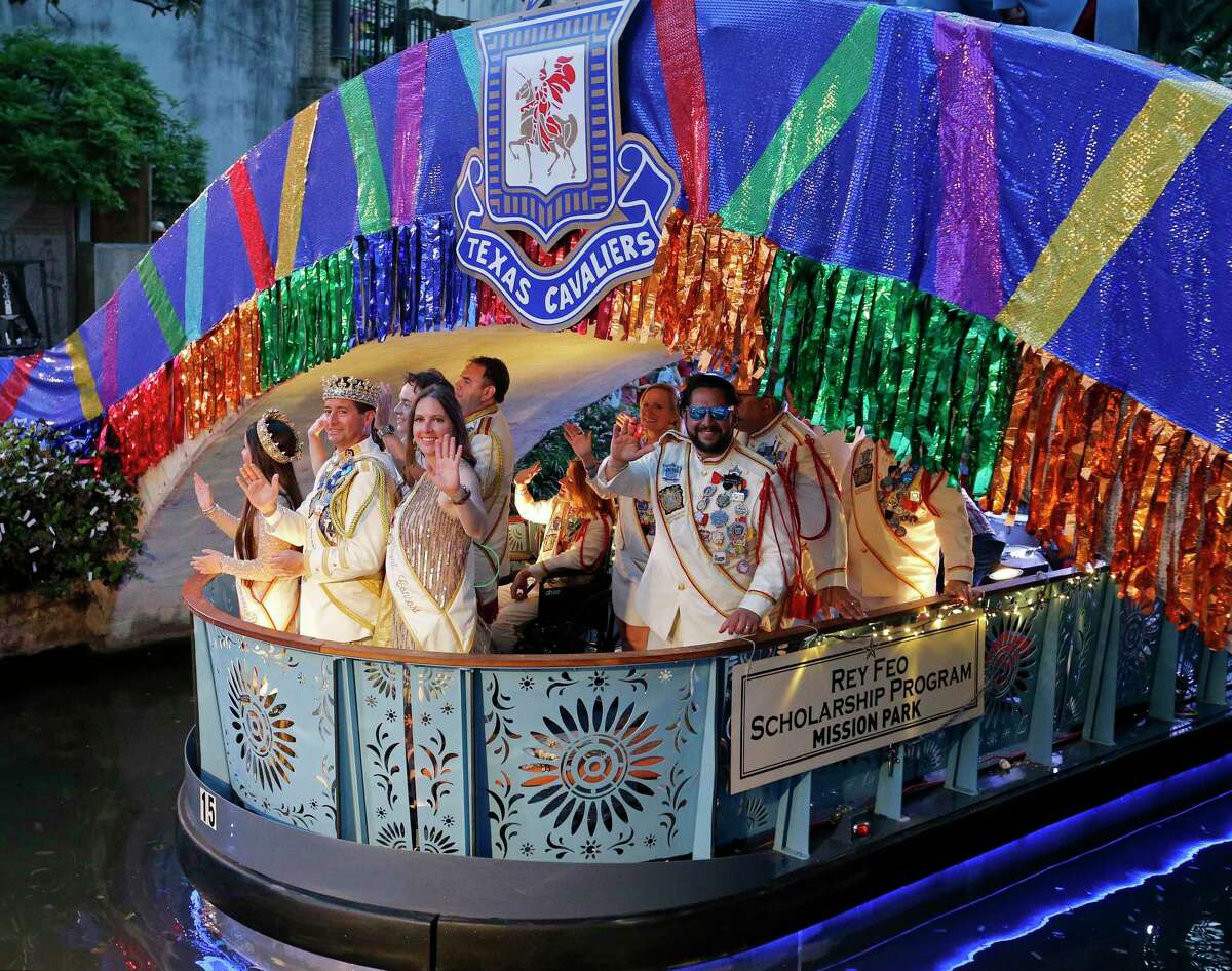 El Rey Feo LXX Kenneth Flores (left center) with his wife Donna and others enter the Arneson River Theatre at La Villita during the 2018 Texas Cavaliers River Parade in 2018. This year’s River Parade will be held June 21.
