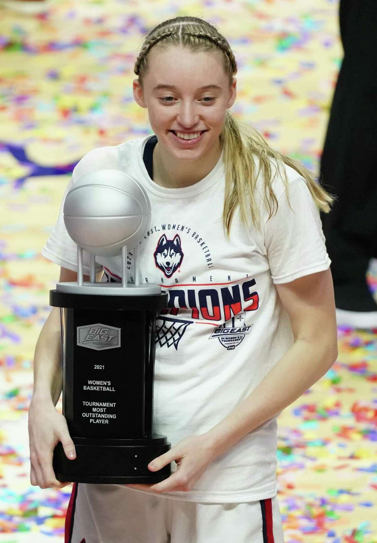 UConn’s Paige Bueckers holds the Most Oustanding Player trophy after winning the Big East Tournament. Bueckers is recovering from ankle surgery and experts say the prognosis is good.