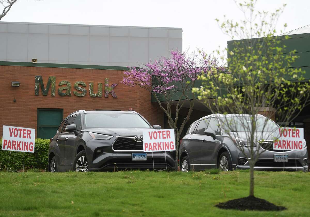 The Masuk High School gymnasium is open for voting on the town budget referendum in Monroe, Conn. on Tuesday, May 4, 2021.