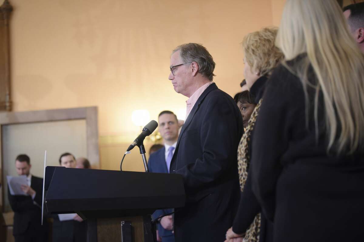 Families who lost loved ones in the Schoharie limo crash look on as Kevin Cushing, at podium, speaks at a press conference at the Capitol about new limo safety regulations on Tuesday, Jan. 14, 2020, in Albany, N.Y. Kevin Cushing lost his son Patrick Cushing in the Schoharie limo crash. (Paul Buckowski/Times Union)
