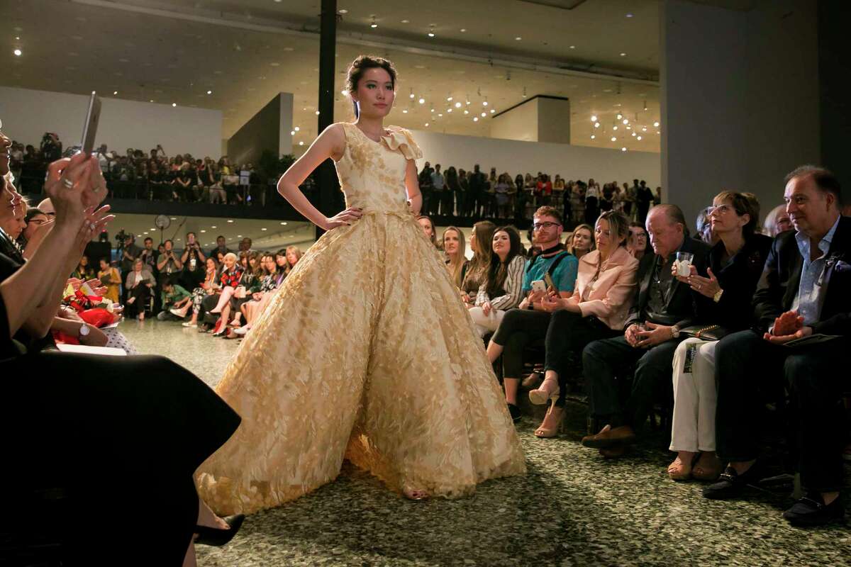 Models walk the runway during Fashion Fusion, an event showcasing HCC student fashion designers' work inspired by the Van Gogh exhibit at the Museum of Fine Arts Houston on Thursday, April 25, 2019.