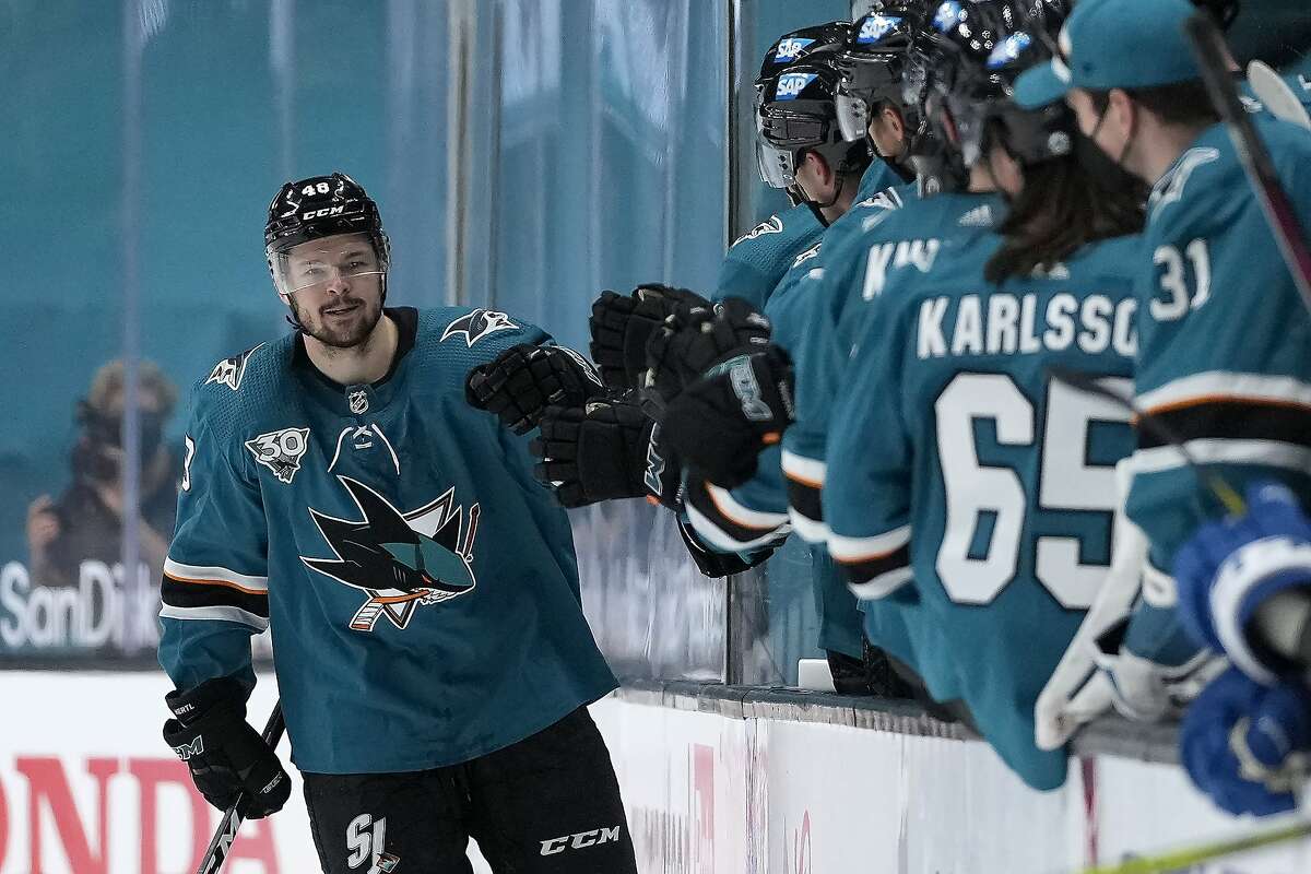 Teammates congratulate Sharks center Tomas Hertl after his second-period goal in a 3-2 win over Colorado at SAP Center. It marked Hertl’s 500th career game.