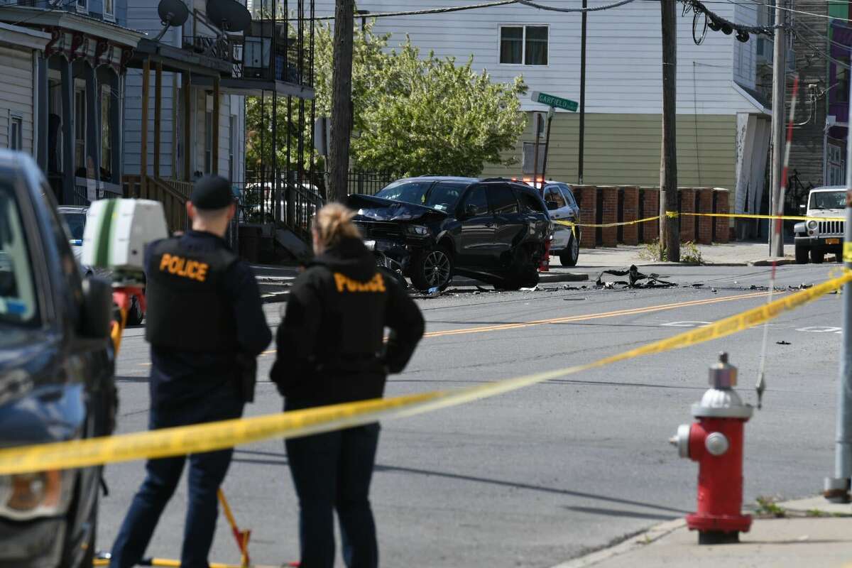 Albany police are investigating a crash that badly injured a man Thursday morning on Watervliet Avenue. The impact of the car  caused a chain reaction that crushed a man between two parked cars, police said.