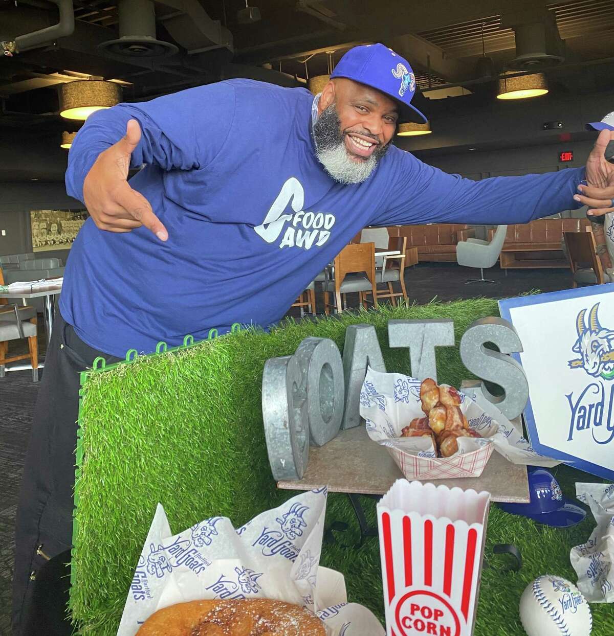 “May 11 is about to get extremely crazy for everyone who’s been waiting for Hartford Yard Goats to open up here at Dunkin’ Donuts Park,” Patterson said. “But what individuals love even more than just baseball is, of course, the food. You're always looking for that new, that exciting, and that flavor at the end of the day.” “We’re very excited to unveil this,” said Yard Goats president Tim Restall at a media event Thursday. “It’s been years in the making.” Patterson was just as exuberant in person as he showcased some of the items planned for the diner. Here are some highlights: