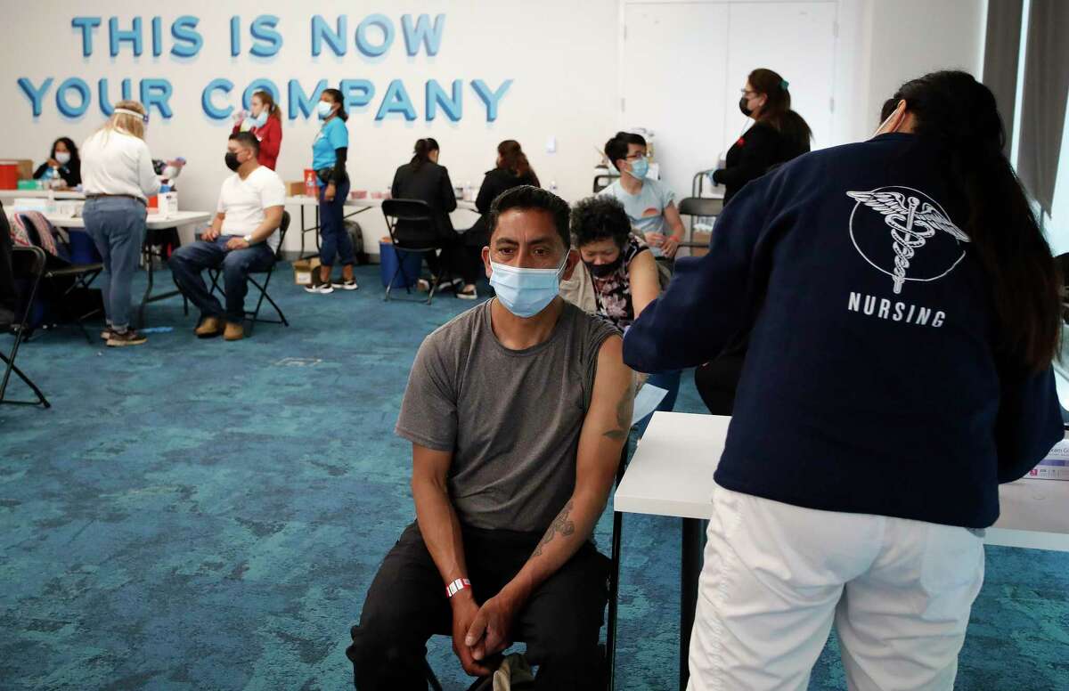 Facebook, which had used its headquarters as a community vaccination hub, will now require all employees to wear masks in the office.