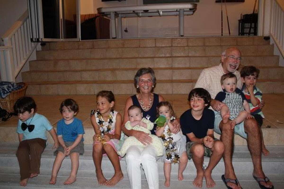 Susan and Dick Helstein with their grandchildren.
