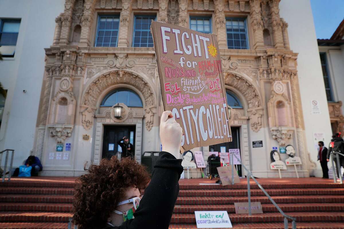 A rally outside Mission High School last week protests proposed cuts to City College of San Francisco.