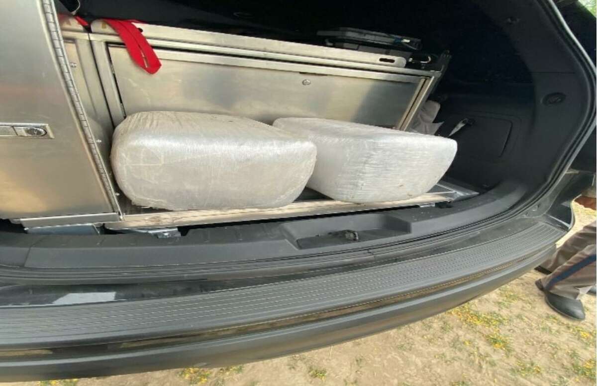Texas Department of Public Safety troopers seized these two marijuana bundles from a vehicle that drove into the Rio Grande in El Cenizo. The contraband weighed about 50 pounds.