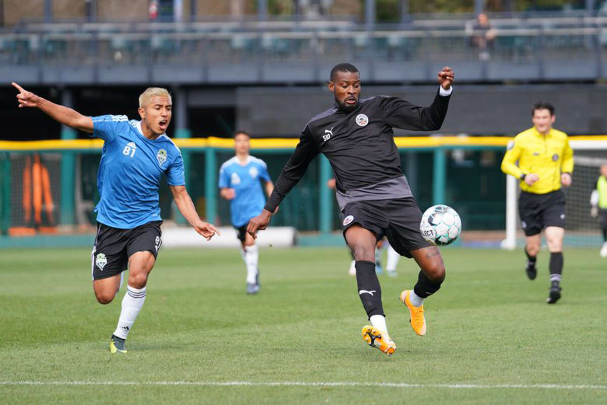 Oakland Roots forward Jeremy Bokilla (right) will likely start up top for the team.