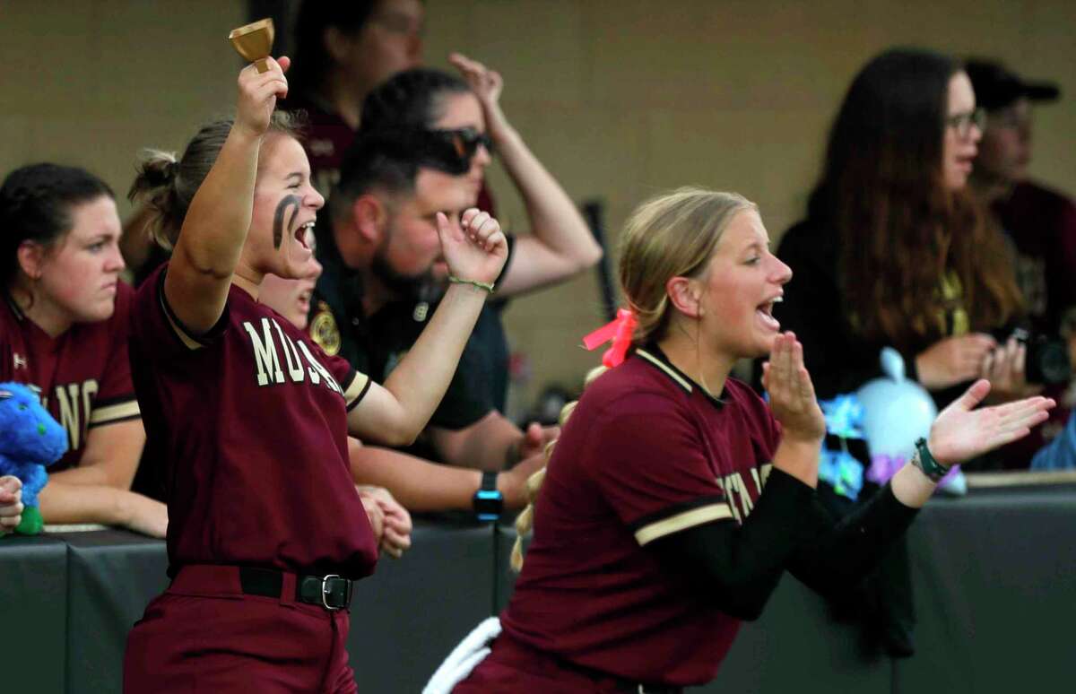 Magnolia West players cheer during a game last week against Dayton.