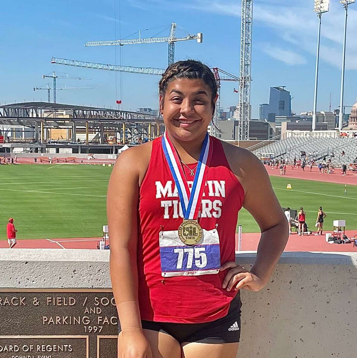 Melanie Duron broke her city record with a throw of 45-0 in the shot put Friday to win the state title.
