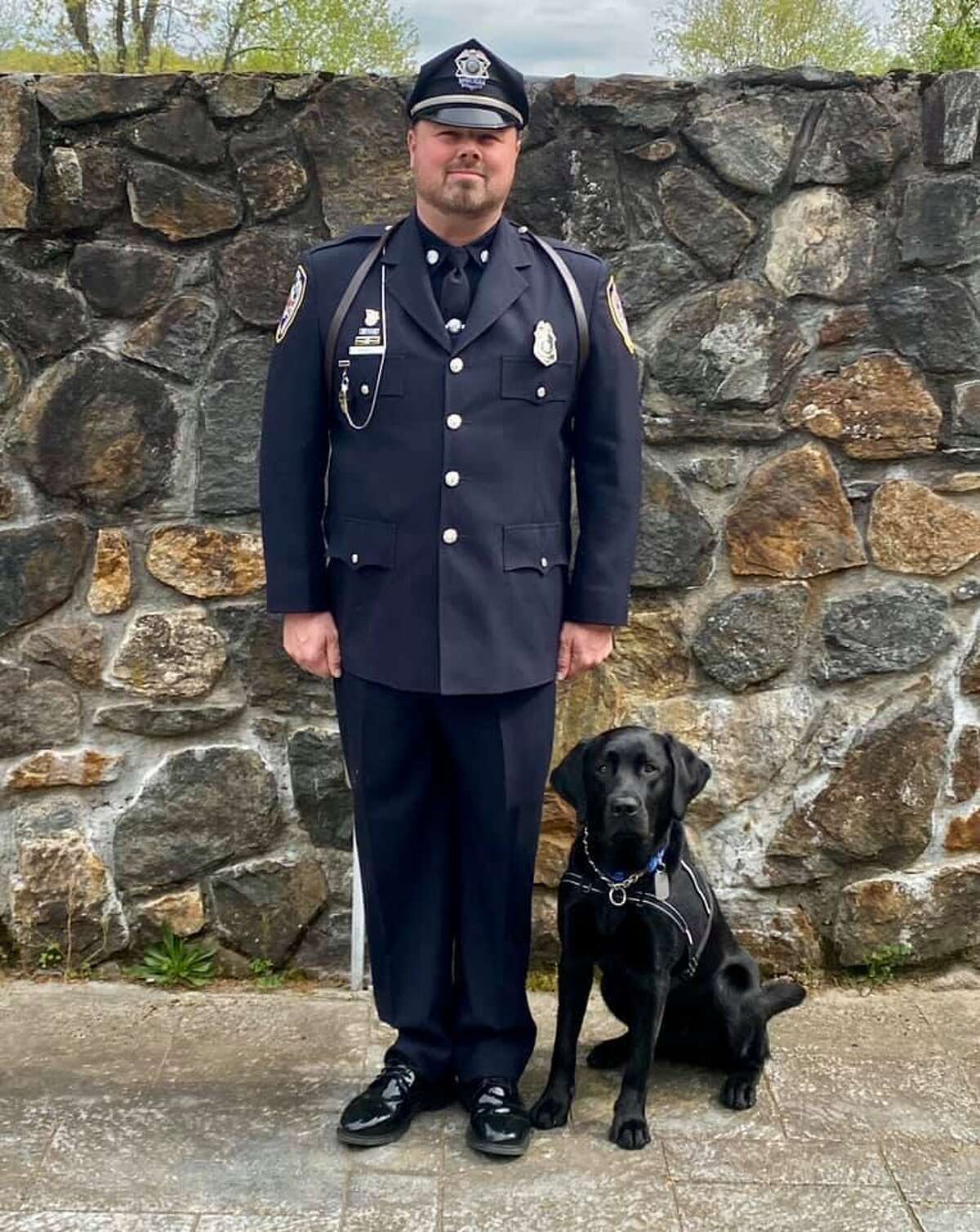 Pictured is Middletown Police Department Officer Jay Bodell and new K-9, Bear. Contributed by Middletown Police Facebook Page.