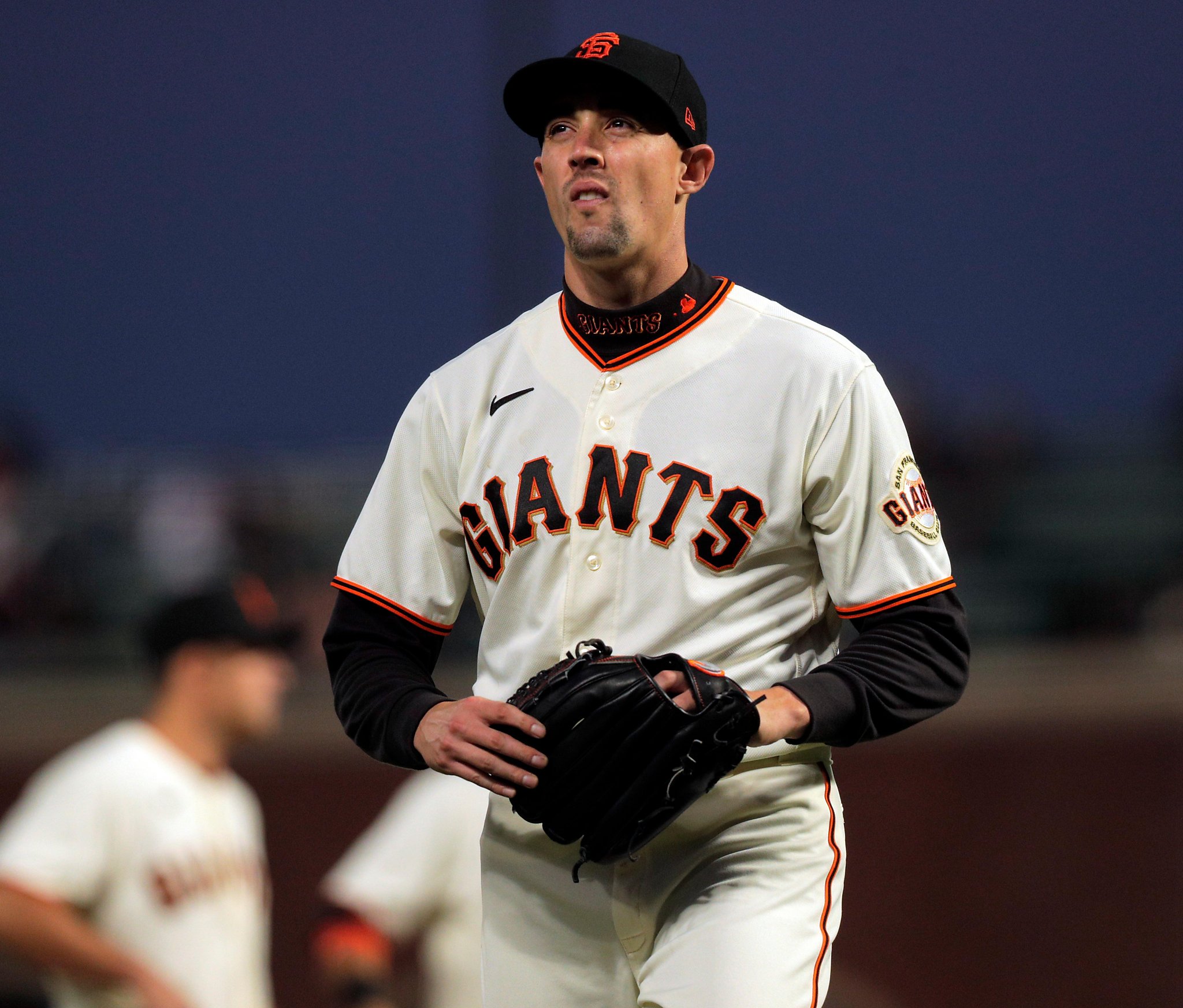 San Francisco Giants' Aaron Sanchez throws to first base during