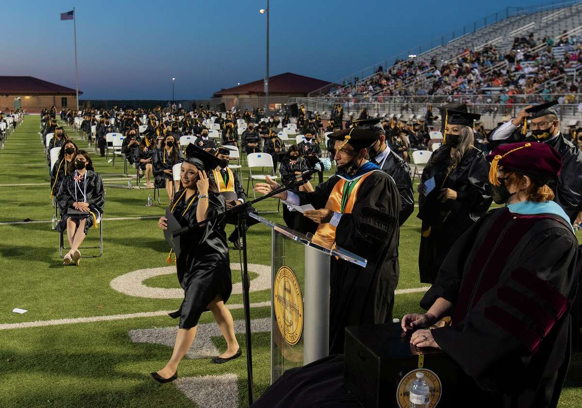 Laredo College graduates line up to receive their diploma on Friday, May 7, 2021 at the UISD Student Activity Complex.