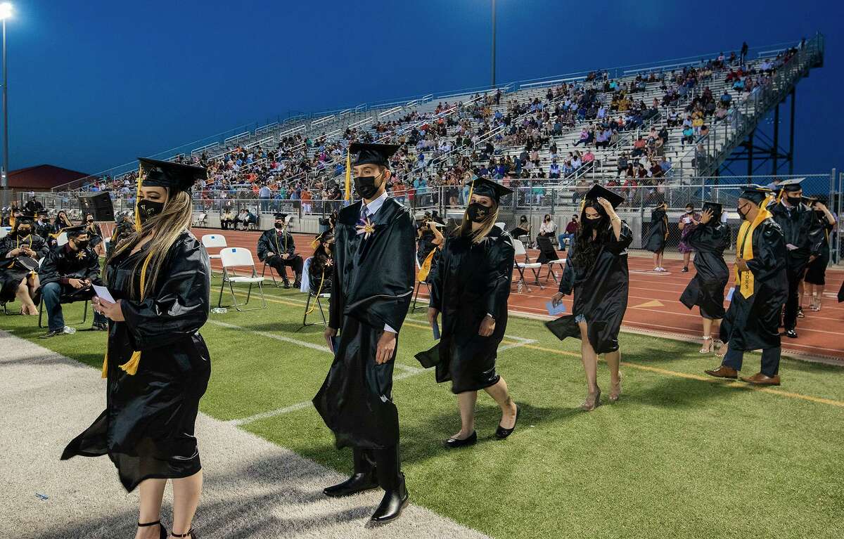 Laredo College graduates line up to receive their diploma, Friday, May 7, 2021, at the UISD Student Activity Complex.