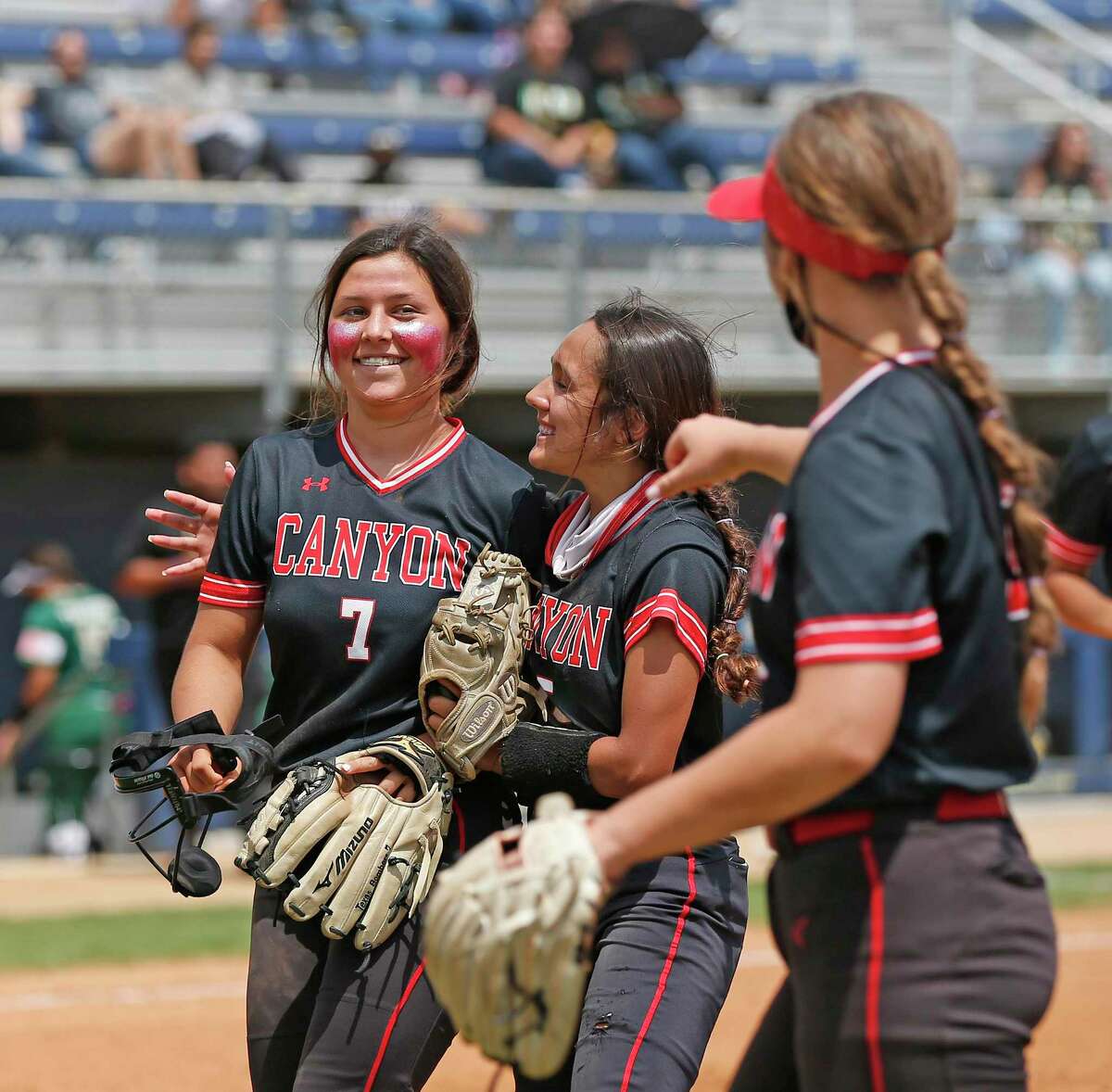 Canyon Bella Mitchell #7 is congratulated by teammates after striking out the batter to end the third inning. Softball playoff Game 2 of best of 3 between New Braunfels Canyon and Southwest Legacy on Saturday, May 8, 2021 at St. Mary's University.