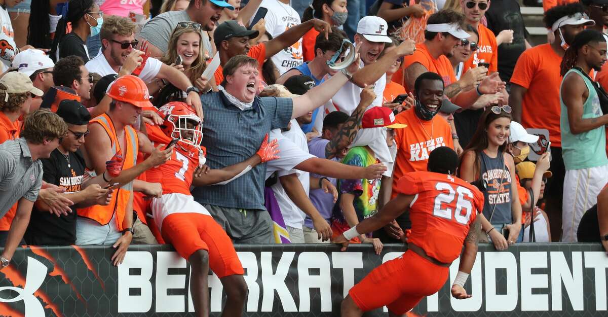 Sam Houston State fans celebrate the Bearkats' 38-35 win over James Madison in a semifinal game in the NCAA FCS football playoffs on Saturday, May 8, 2021, in Huntsville.