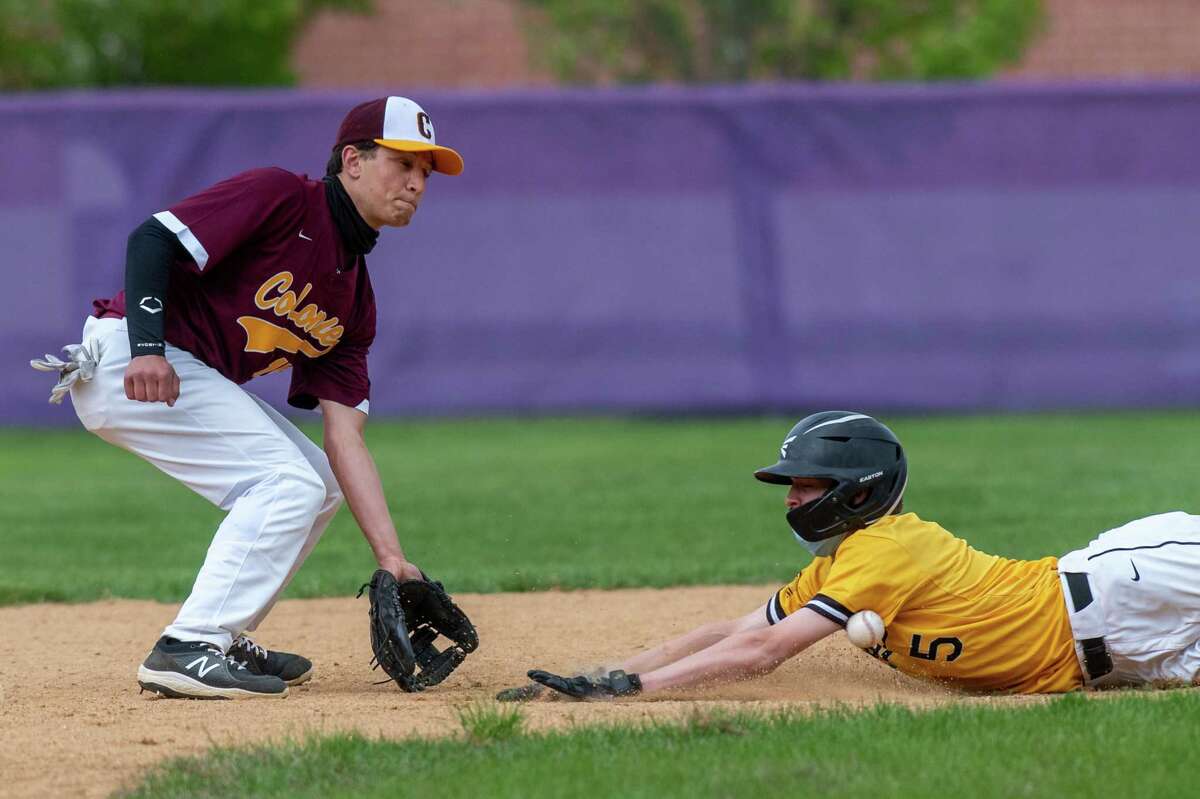 Colonie second baseman Brandon Baumann is a little late getting the ball and Ballston Spa baserunner Ryan Nagengast slides safely into second base during a game at Ballston Spa High School on Saturday, May 8, 2021. (Jim Franco/Special to the Times Union)