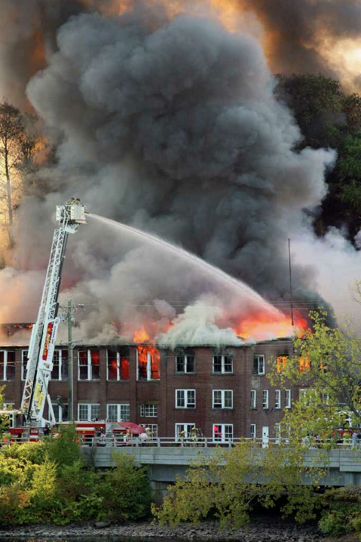 A raging fire ravaged the vacant Housatonic Wire factory complex on River Street. Sept. 11, 2010 Fire destroys the Housatonic Wire complex in Seymour. The building was slated to be the site of a new development. Read more.