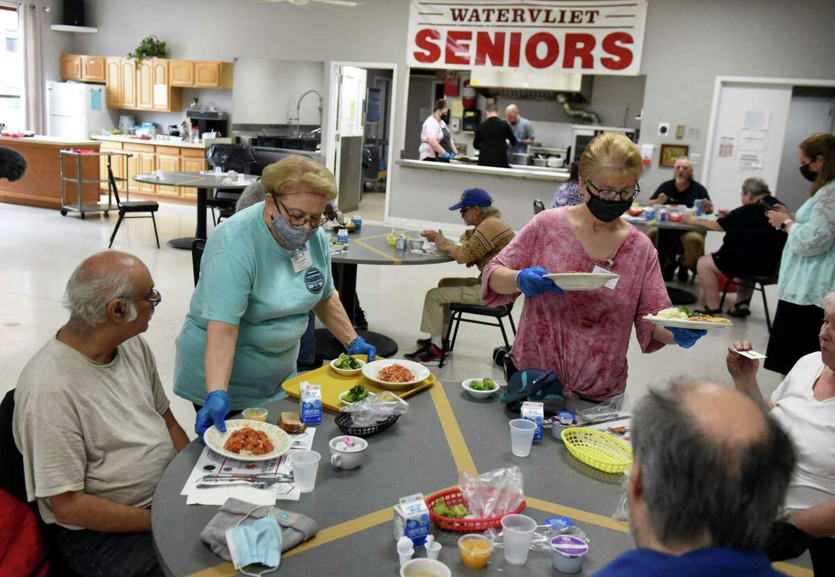 Lunch is served to seniors at the Watervliet Senior Center during the opening of Albany County's first congregate meal site since the beginning of the pandemic on Monday, May 10, 2021, in Watervliet , N.Y. It is part of a new pilot program with LifePath. (Will Waldron/Times Union)