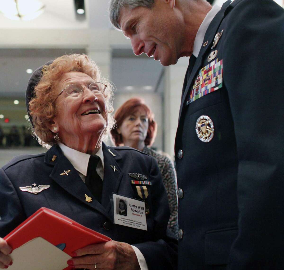 In this March 10, 2010 file photo, Air Force Chief of Staff Gen. Norton Schwartz greets Elizabeth Strohfus of Faribault, Minn., on Capitol Hill in Washington, before she and other members of the Women Airforce Service Pilots were awarded the Congressional Gold Medal.
